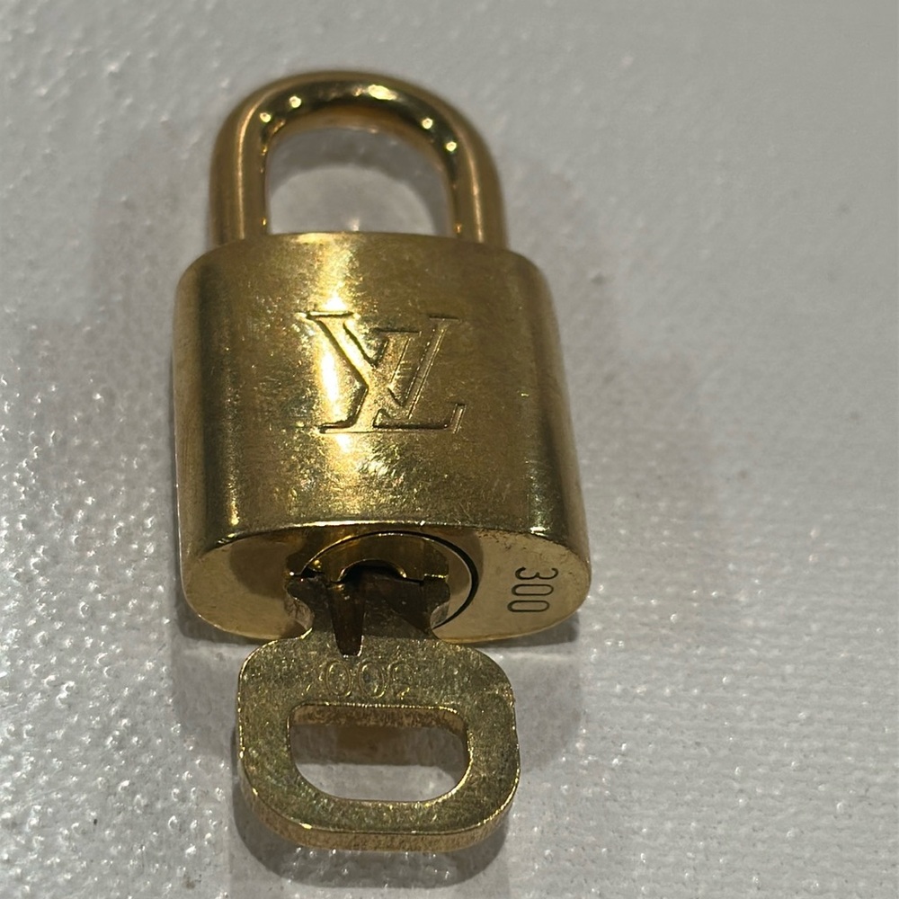 Louis Vuitton Authentic Vintage Lock and Key # 300